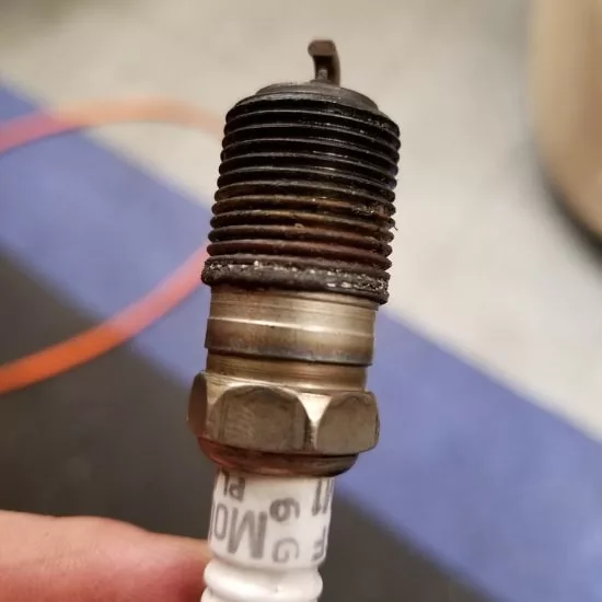 what-causes-a-spark-plug-to-turn-black